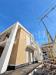 Villa in vendita con giardino a Marino - 02, Cantiere moderno sotto il cielo blu (1).png