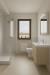 Appartamento in vendita a Noventa Vicentina - 04, Bagno moderno con luce naturale.png
