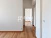 Appartamento bilocale in vendita ristrutturato a Firenze - 07, Corridoio Minimalista in Luce Naturale.png