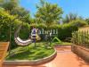 Appartamento in vendita con giardino a Scandicci - 03, Giardino soleggiato con giochi e patio.png