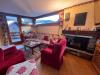 Appartamento in vendita con giardino a Courmayeur in via les golettes 21 - 02, VENDITA COURMAYEUR: salotto con camino