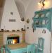 Casa indipendente in vendita con giardino a Tresnuraghes in via roma 41 - 06, cucina camino_tavolo_piattaia (6).jpg