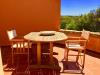 Appartamento bilocale in vendita con terrazzo a Trinit d'Agultu e Vignola - isola rossa - 02, tavolo muro.jpg