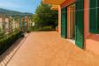 Appartamento in affitto con giardino a Rapallo - 04, Terrazza mediterranea sotto il sole.png
