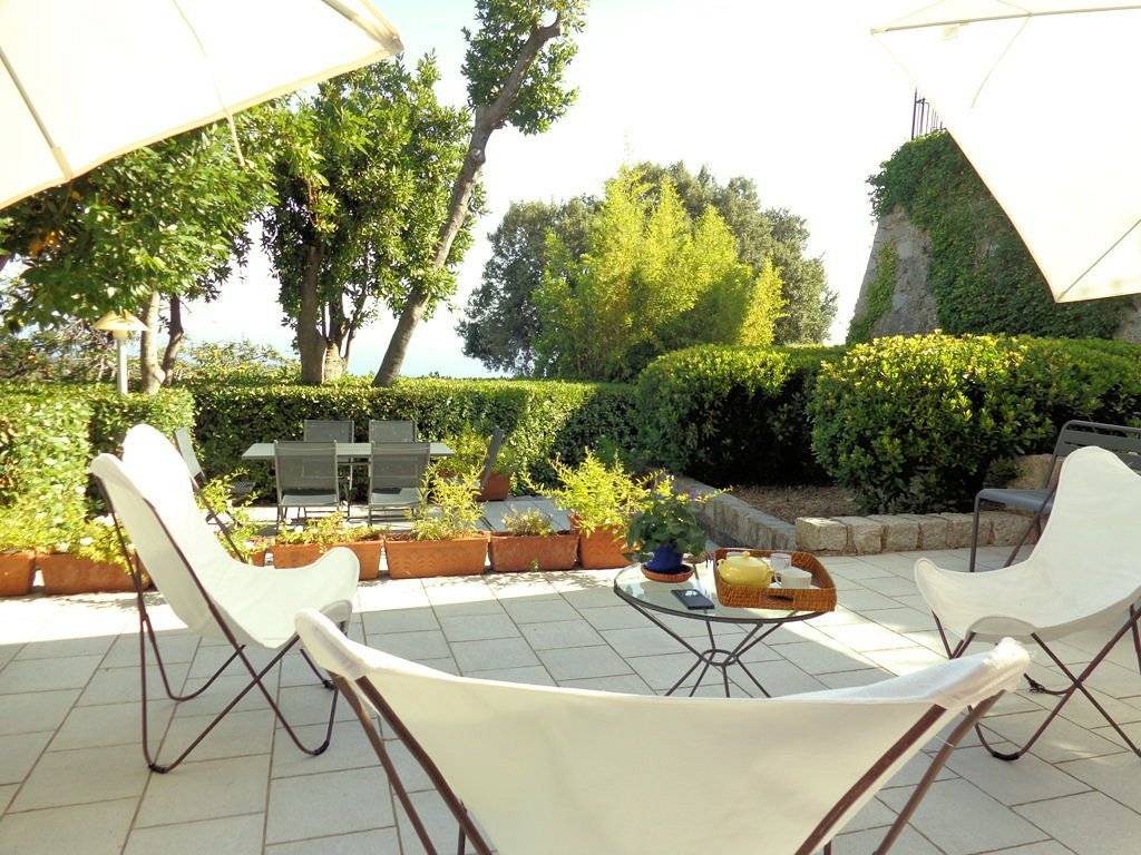 Porzione terratetto libero su tre lati con giardino e vista mare in vendita a Marciana, Poggio