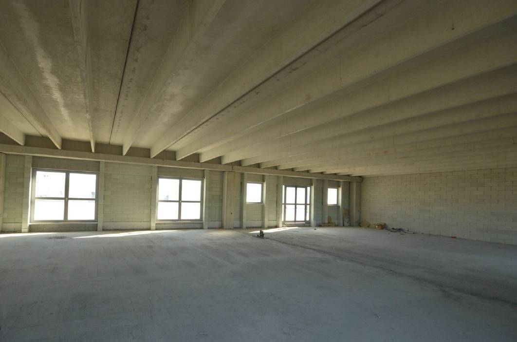 Locale commerciale in affitto a Grugliasco