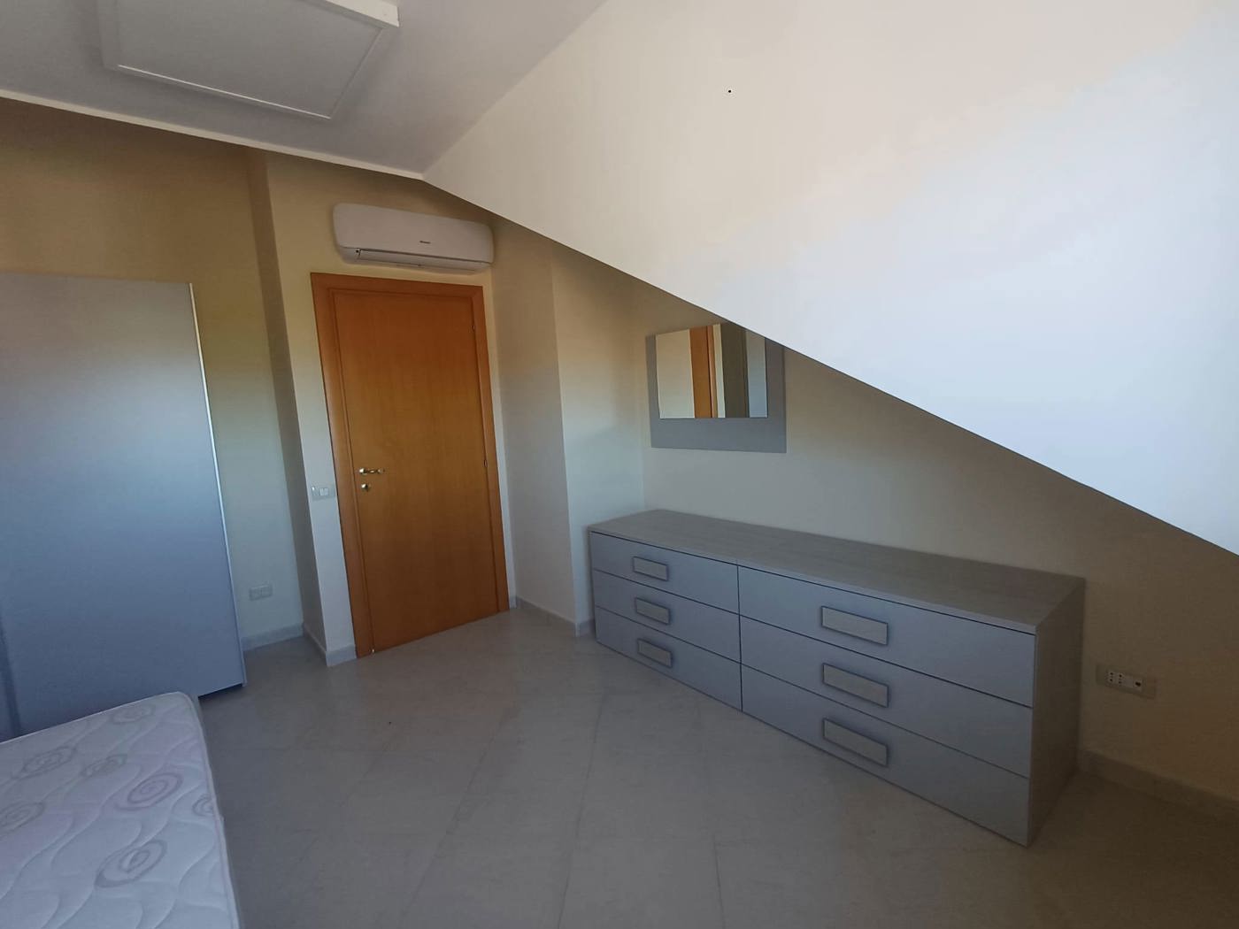 Attico arredato in affitto a San Nicola la Strada