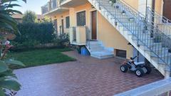 Appartamento con giardino, Massa marina di