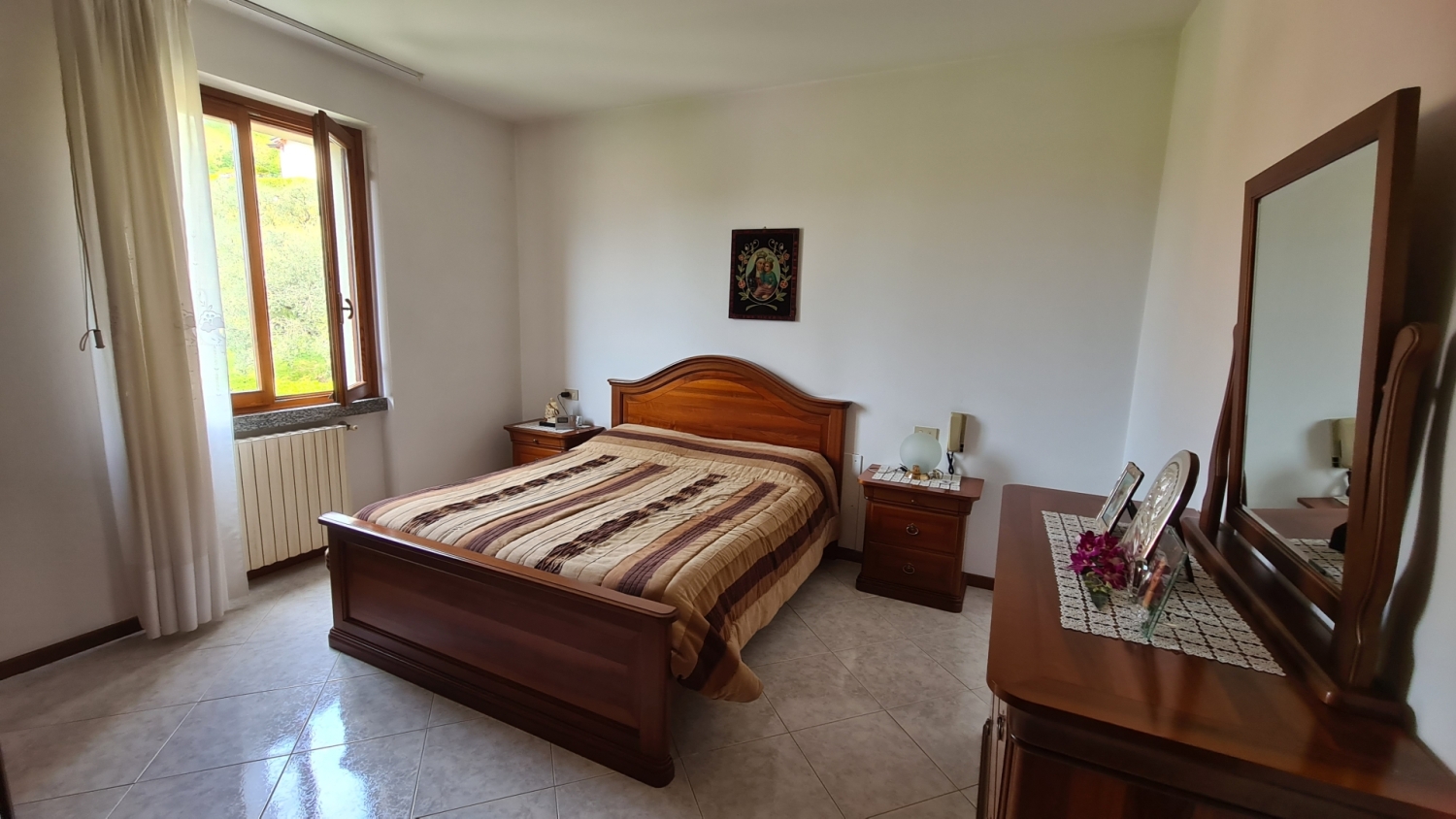 Quadrilocale con giardino a Monte Isola