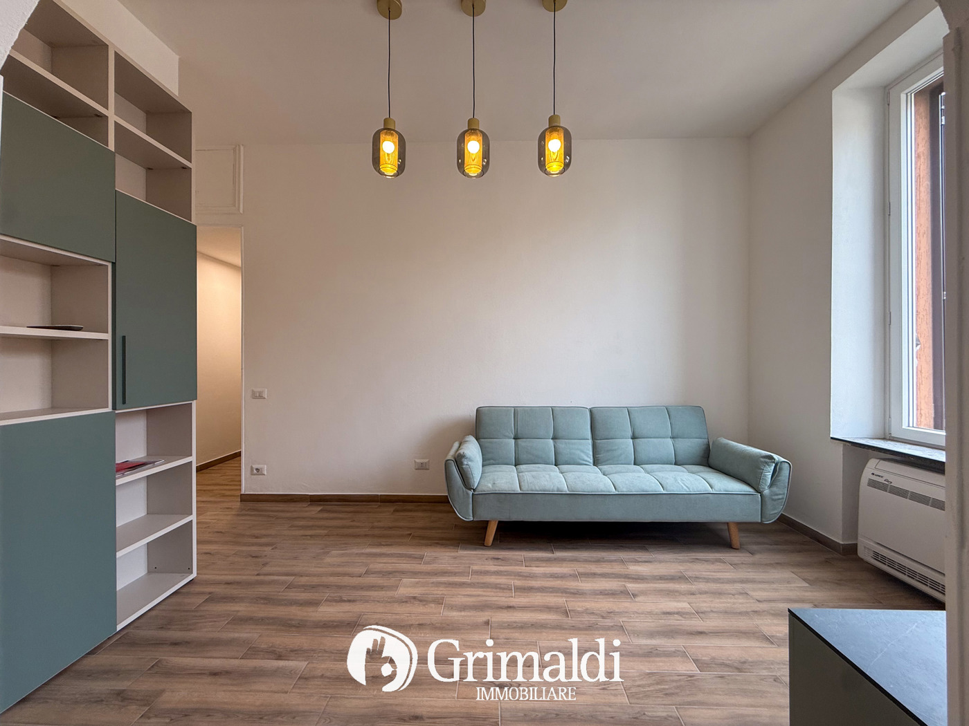 Trilocale arredato in affitto a Monza