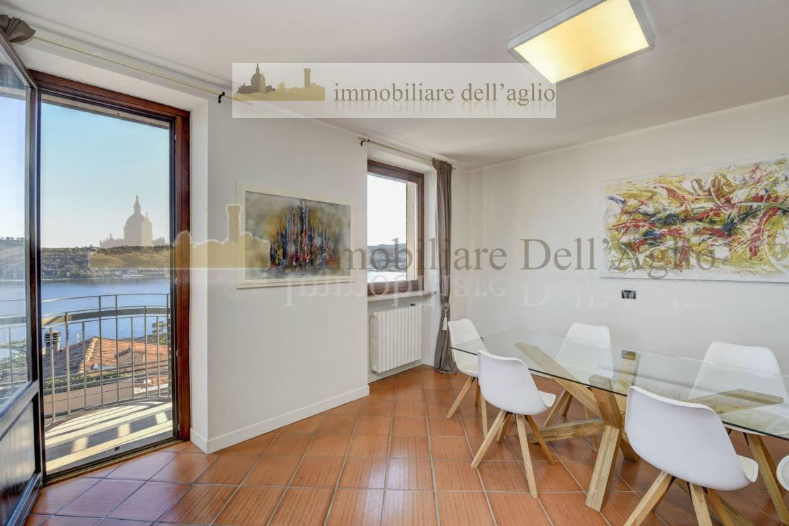 Attico vista lago a Sal�