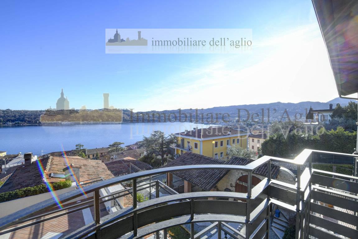 Attico vista lago a Sal�