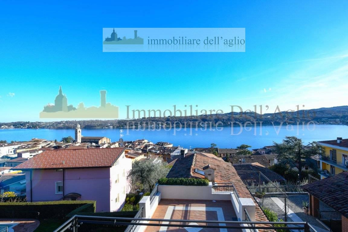 Attico vista lago a Sal�