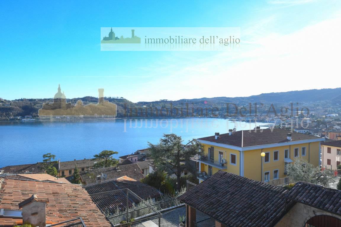 Attico vista lago a Sal�