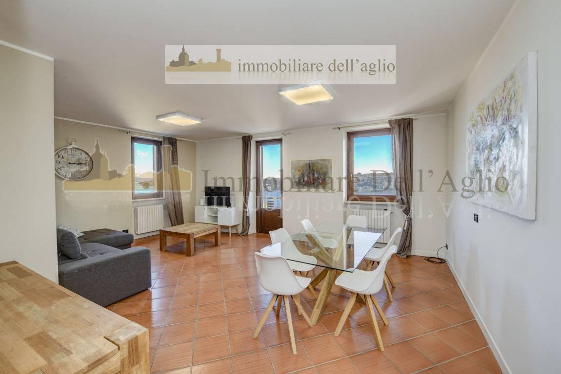 Attico vista lago a Sal�