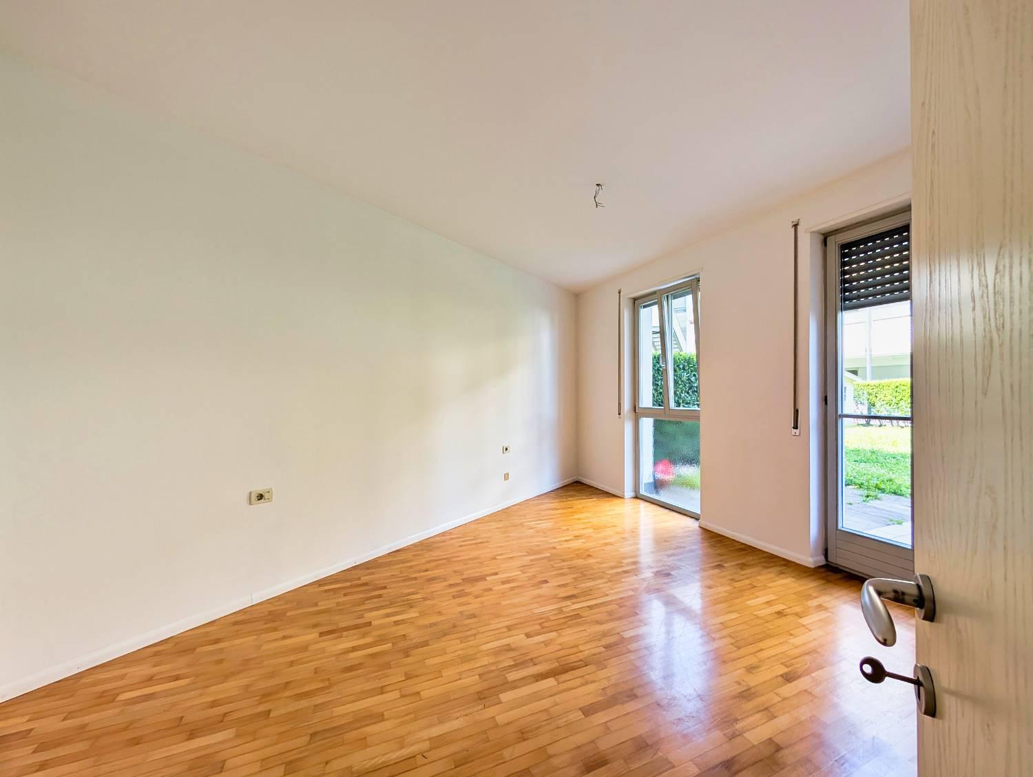 Bilocale con giardino a Laives