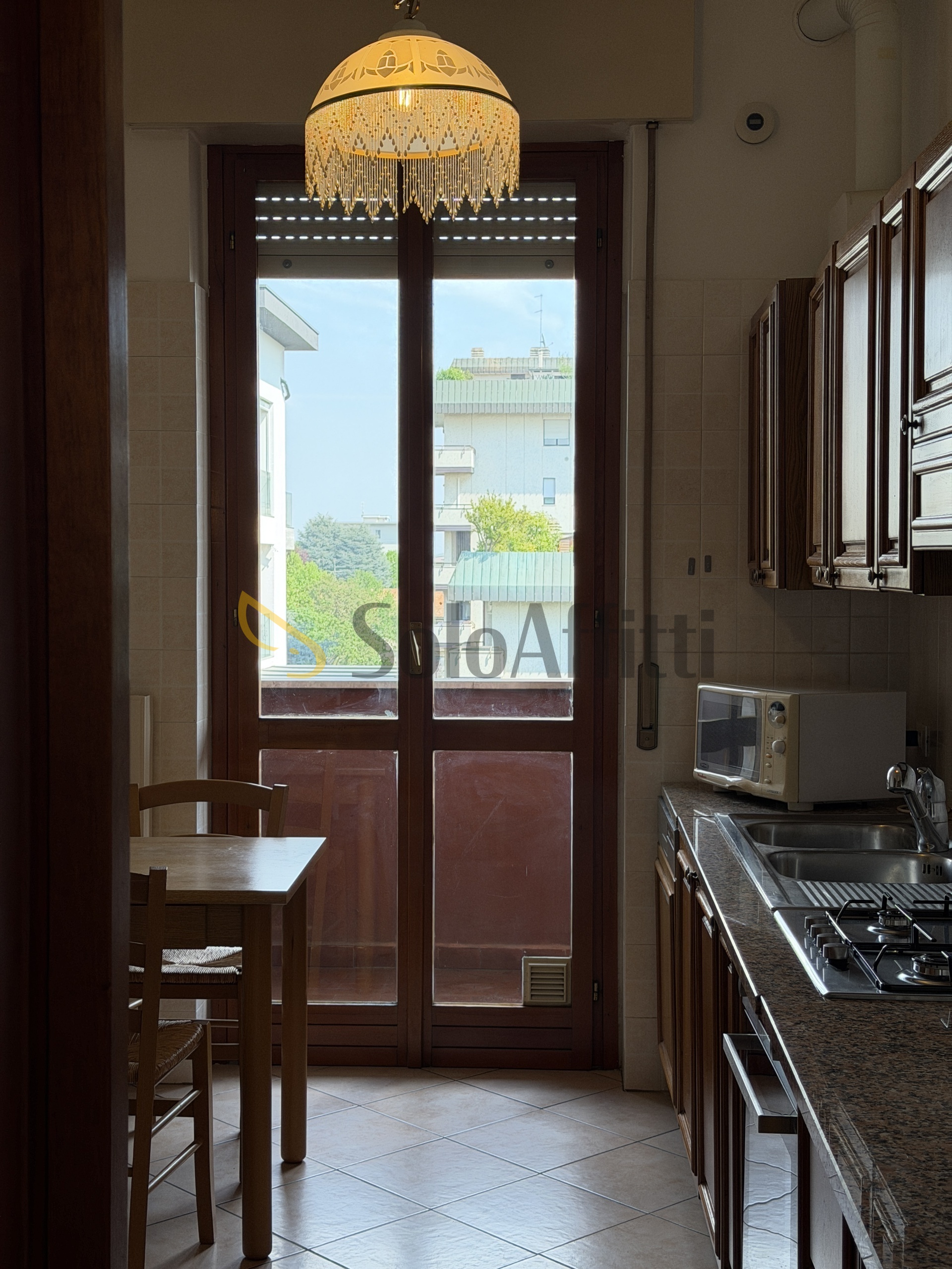 Trilocale con box in via monte grappa 23, Saronno