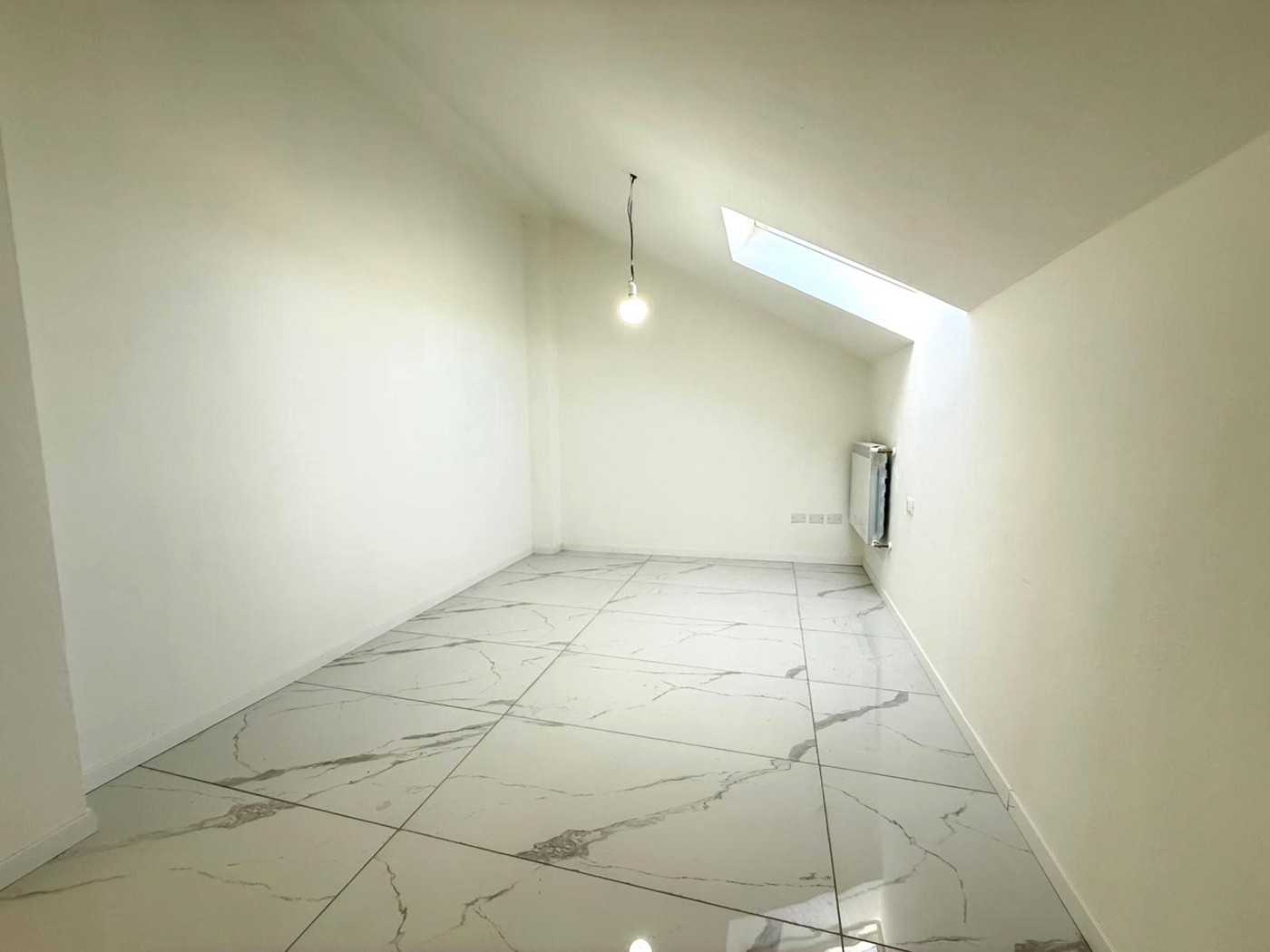 Attico ristrutturato a Rovato