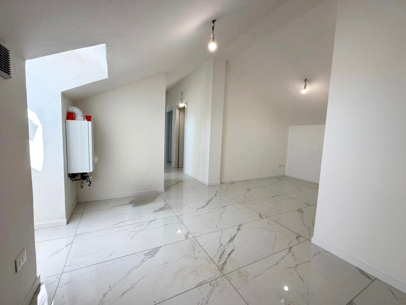 Attico ristrutturato a Rovato