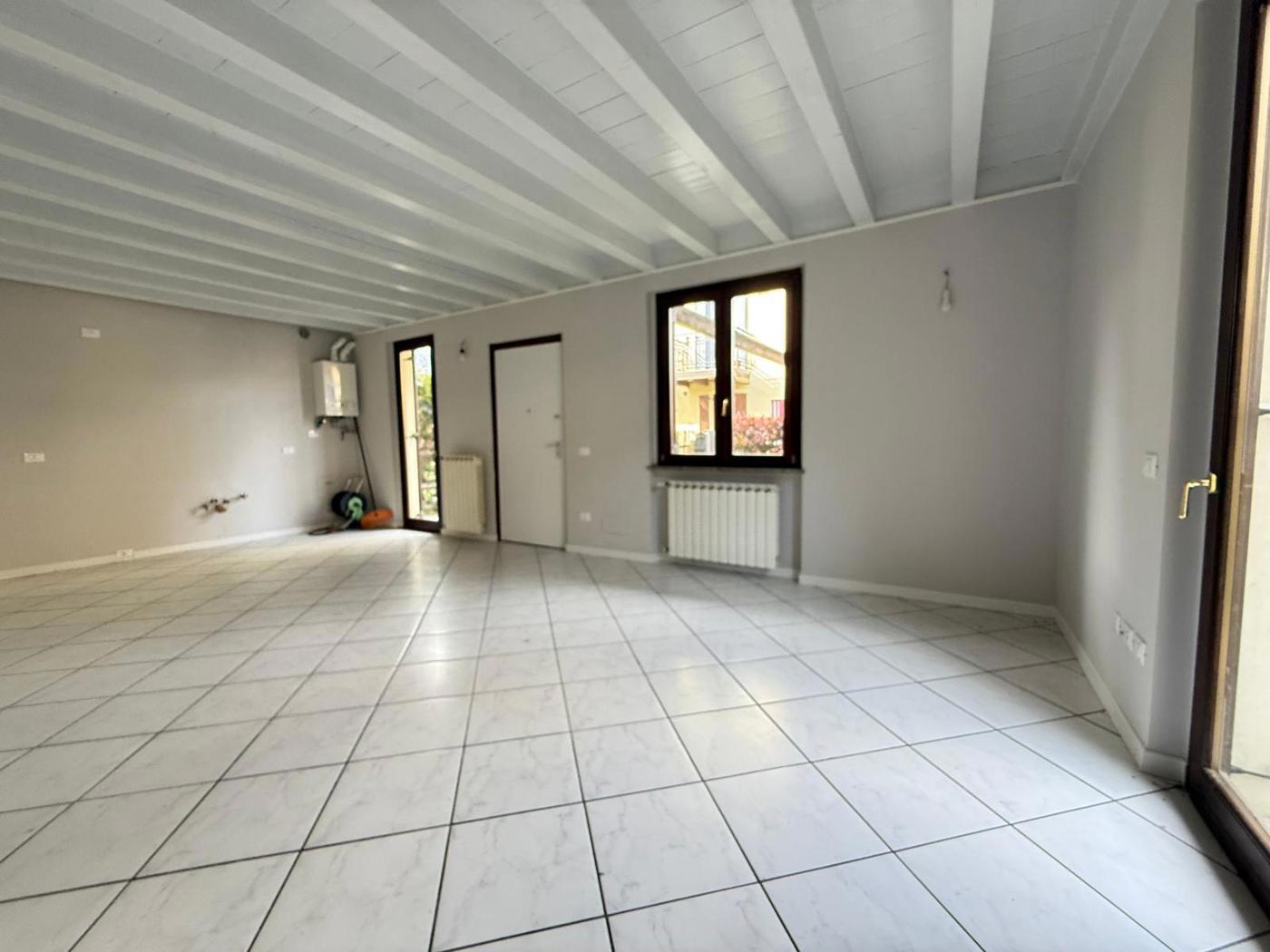 Trilocale con giardino a Corte Franca