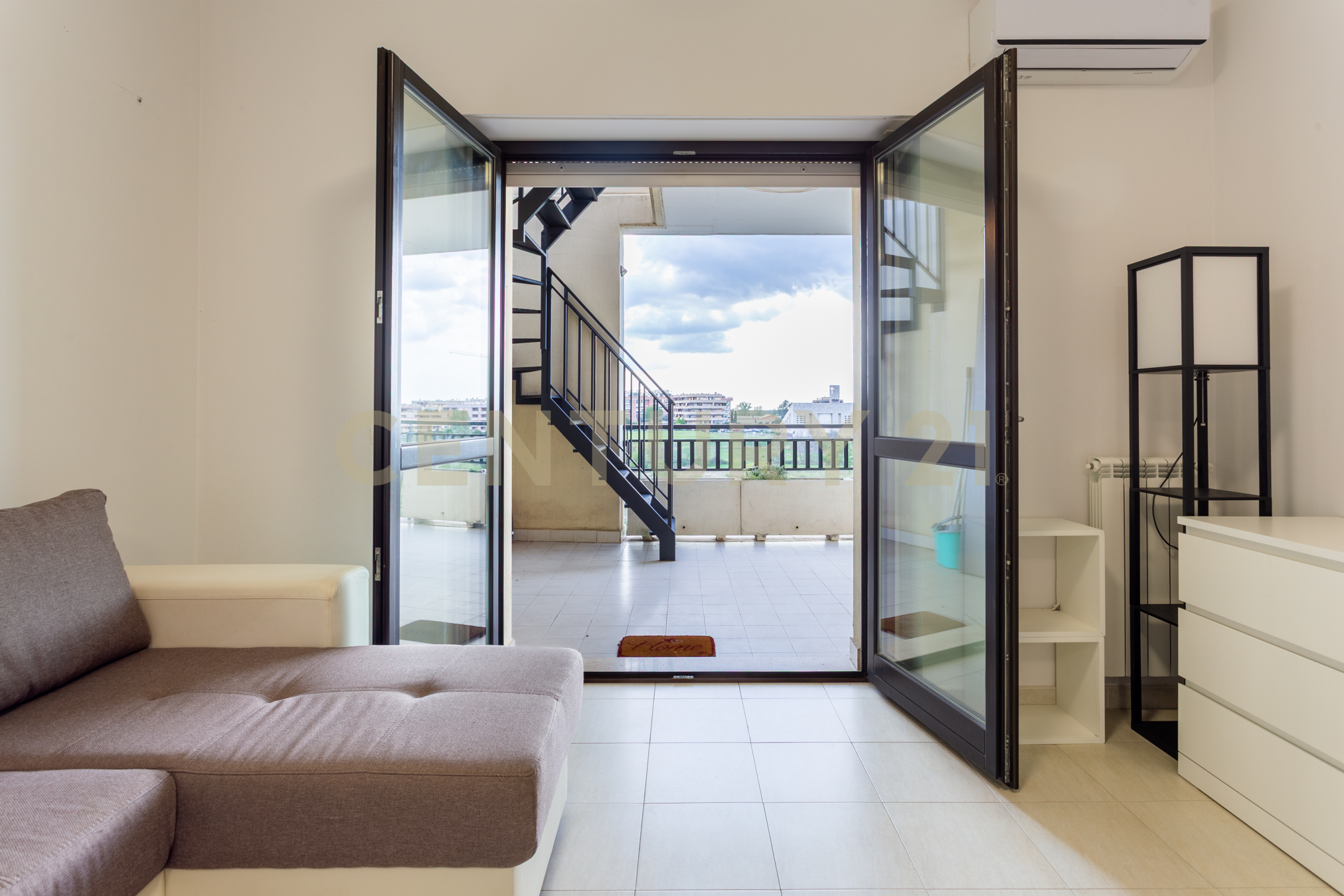 Attico con terrazzo in via natale prampolini 15, Roma