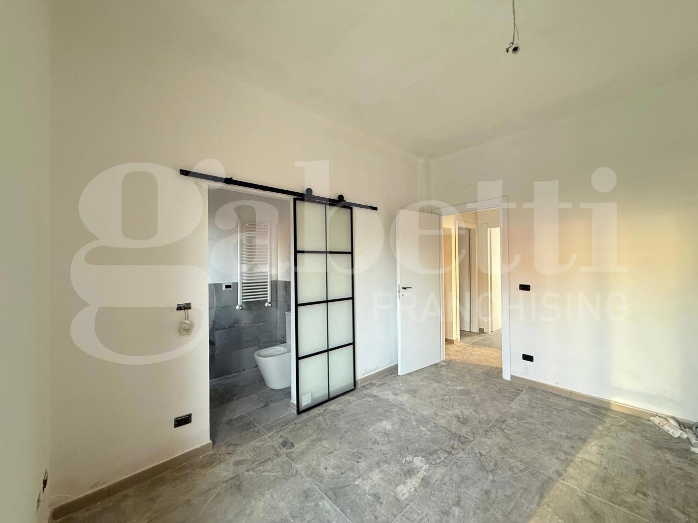 Quadrilocale con box a Grugliasco