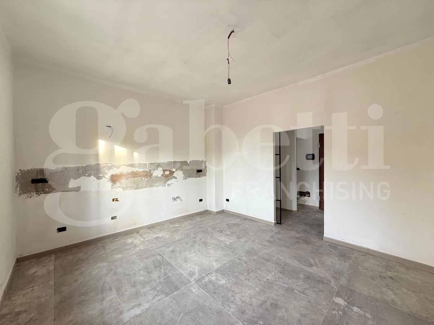 Quadrilocale con box a Grugliasco