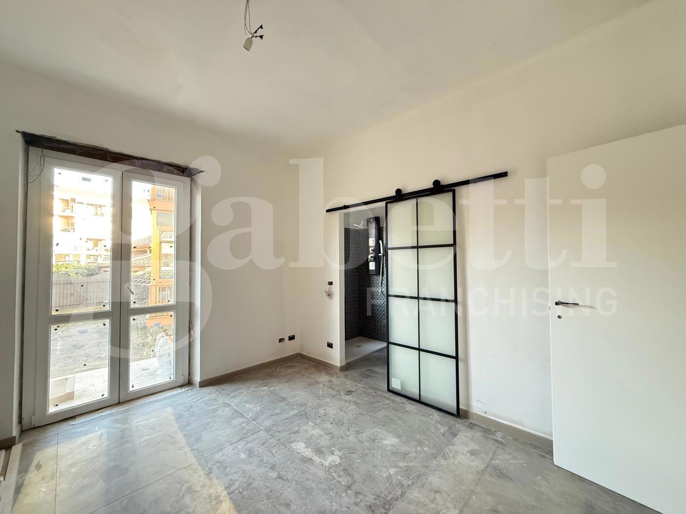 Quadrilocale con box a Grugliasco