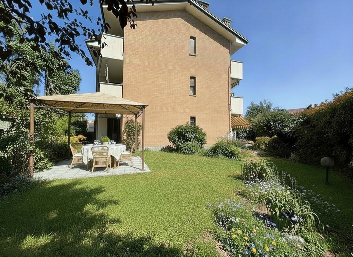 Trilocale con giardino a Caronno Pertusella