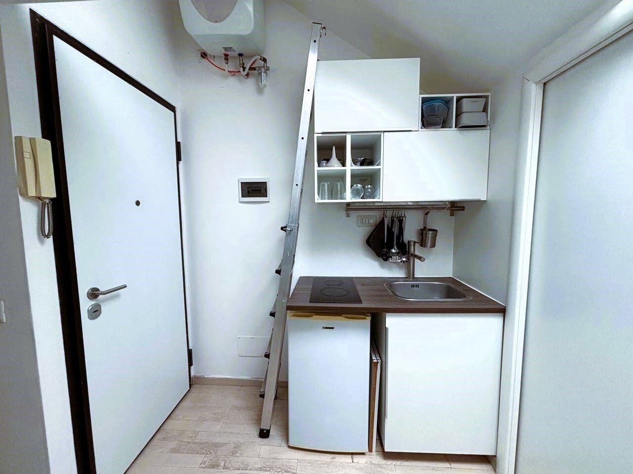 Appartamento con giardino in via della sila 21, Milano