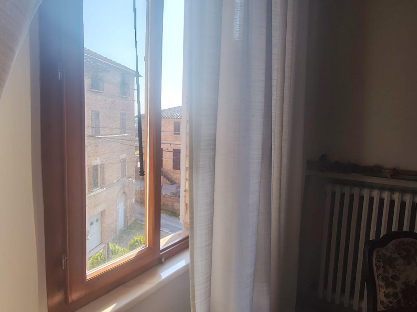 Appartamento con terrazzo, Siena costalpino