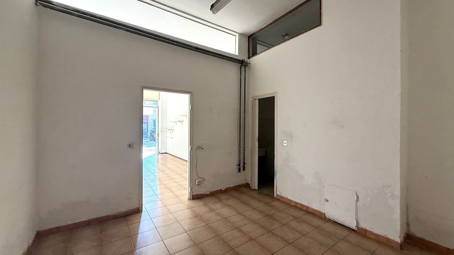 Locale commerciale in affitto a Maslianico
