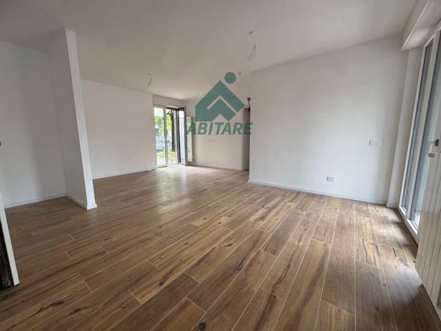 Trilocale con giardino a Rho