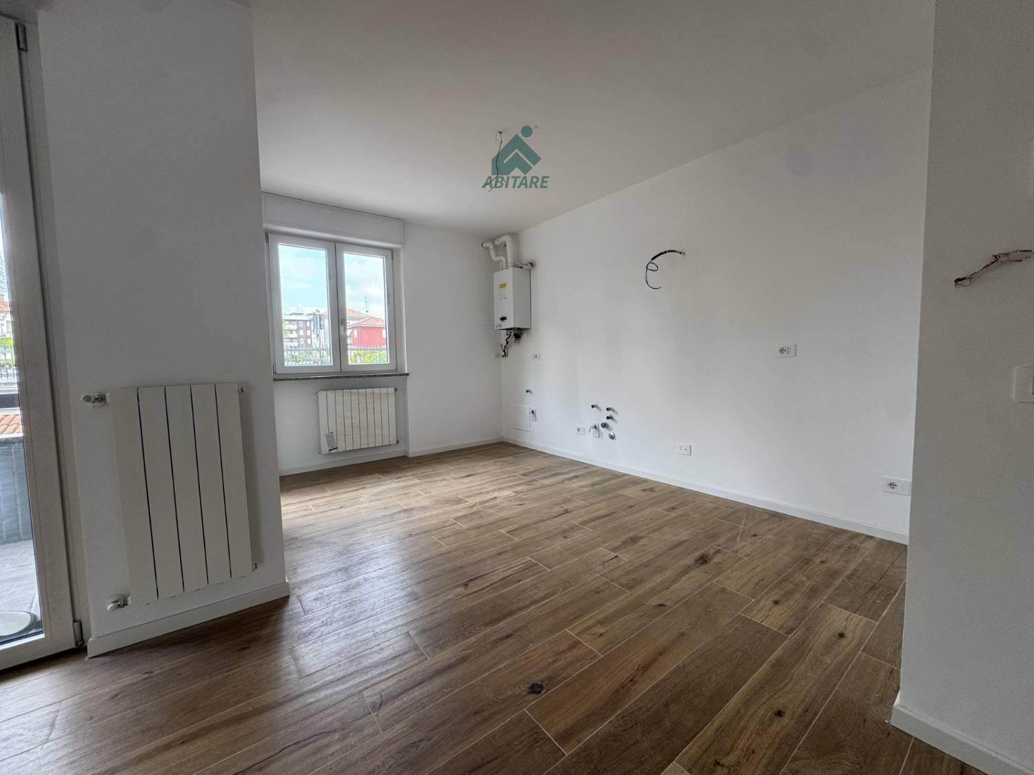 Trilocale con giardino a Rho