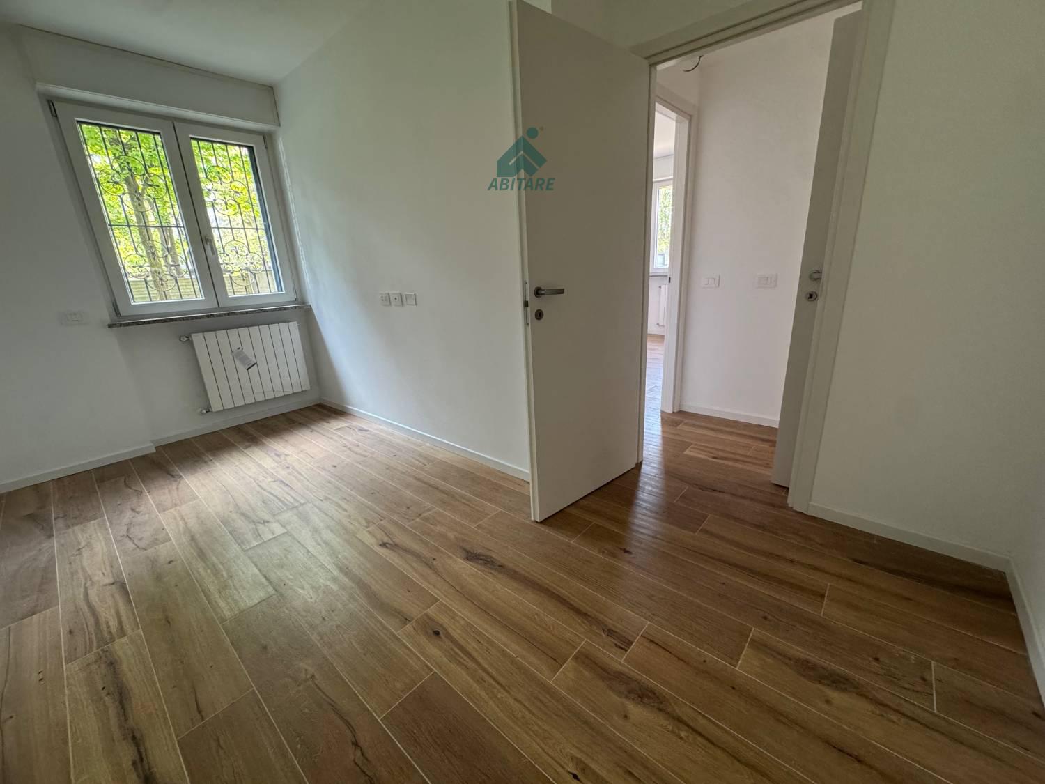 Trilocale con giardino a Rho