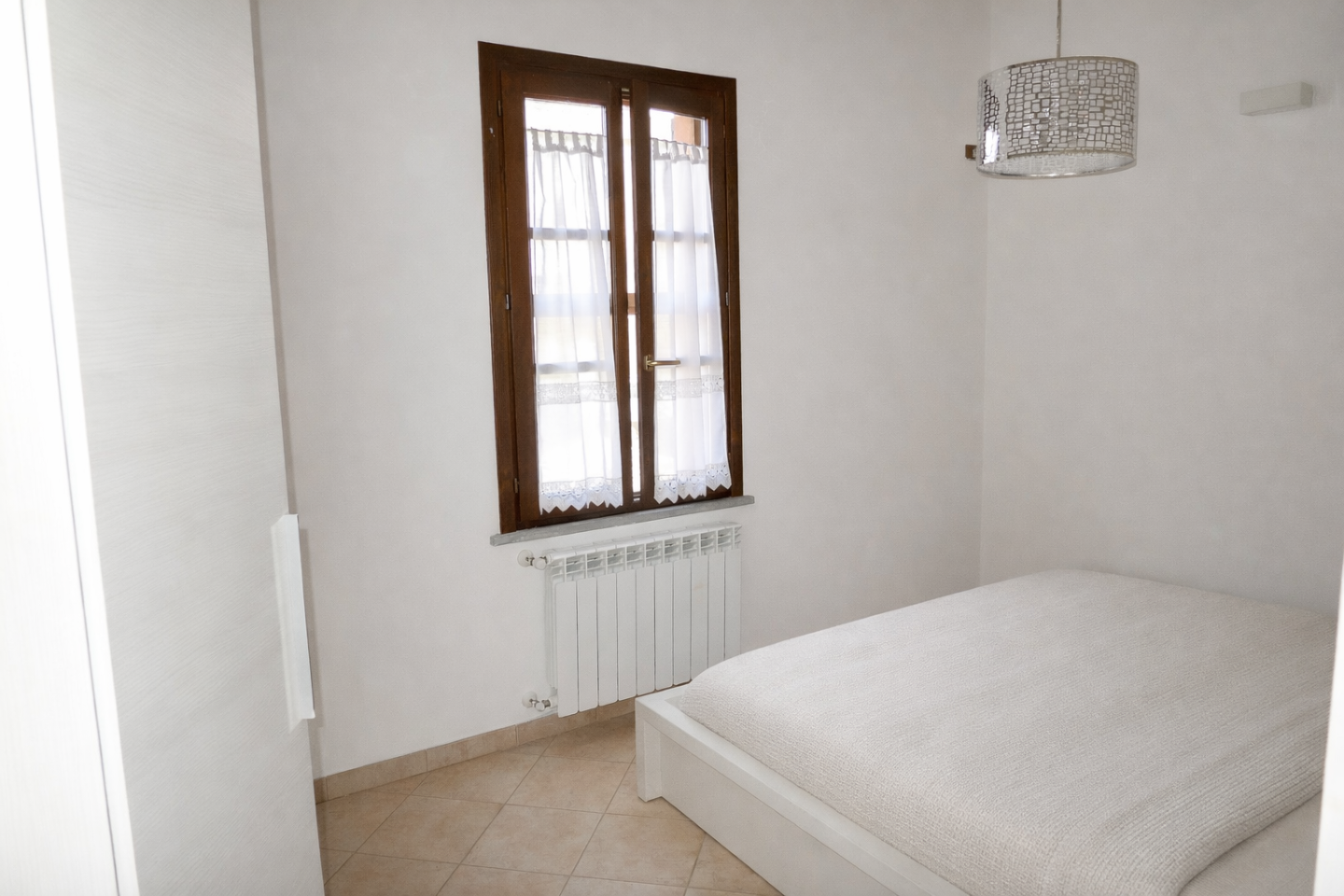 Bilocale arredato in affitto a Cascina