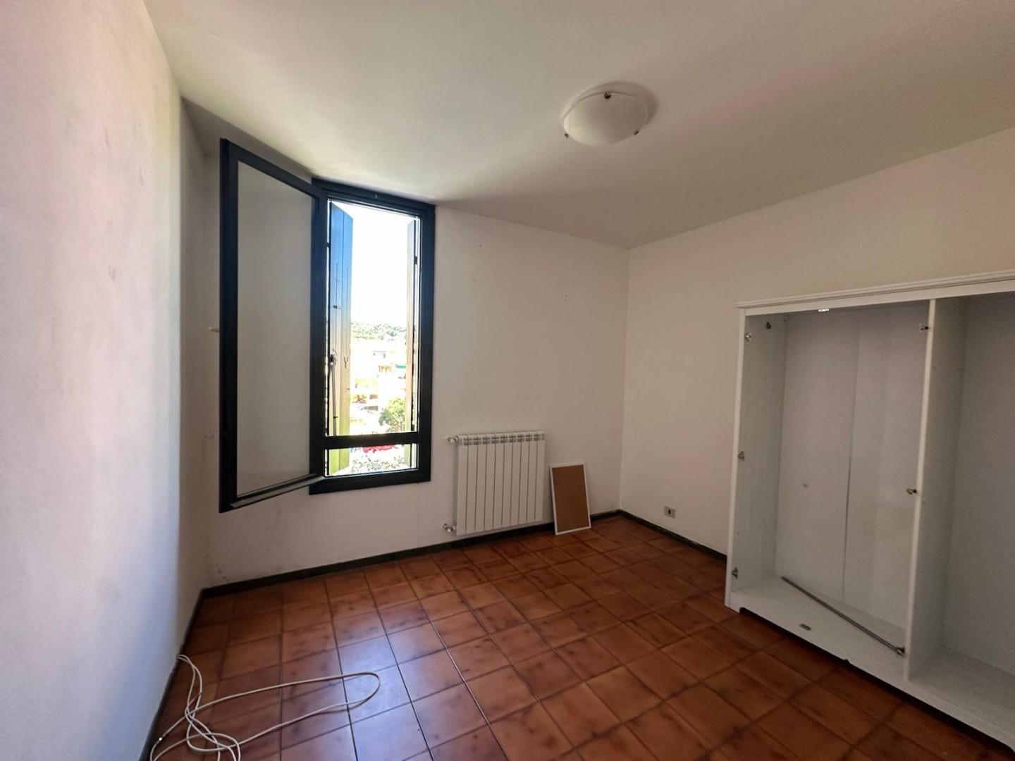 Trilocale con terrazzo a Porto Azzurro