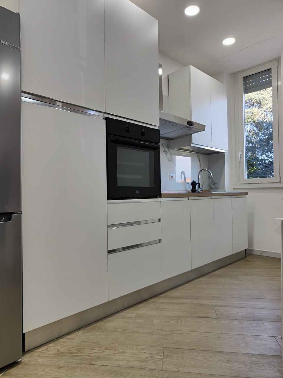 Trilocale arredato in affitto a Monza