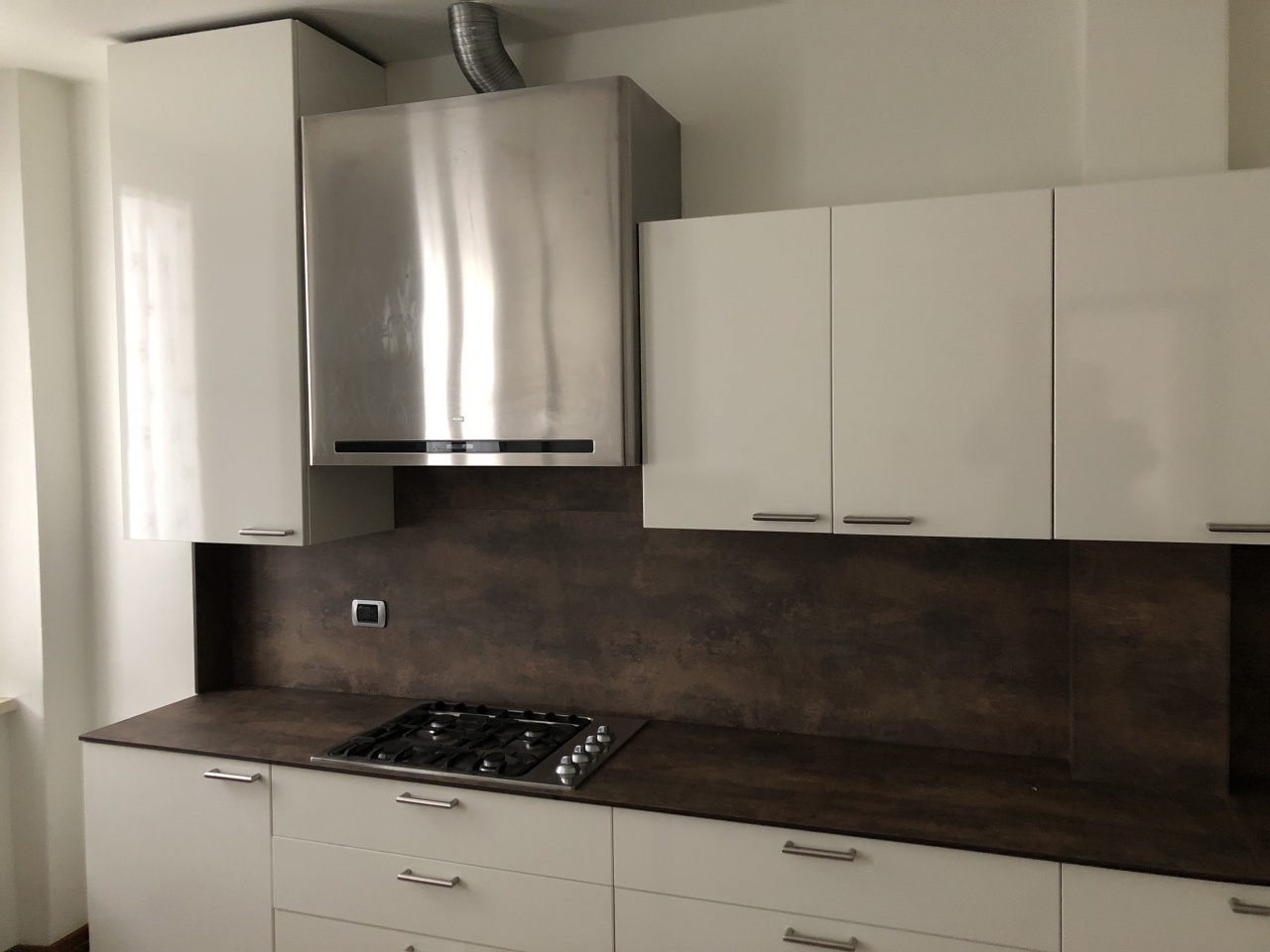 Quadrilocale con terrazzo a Monza