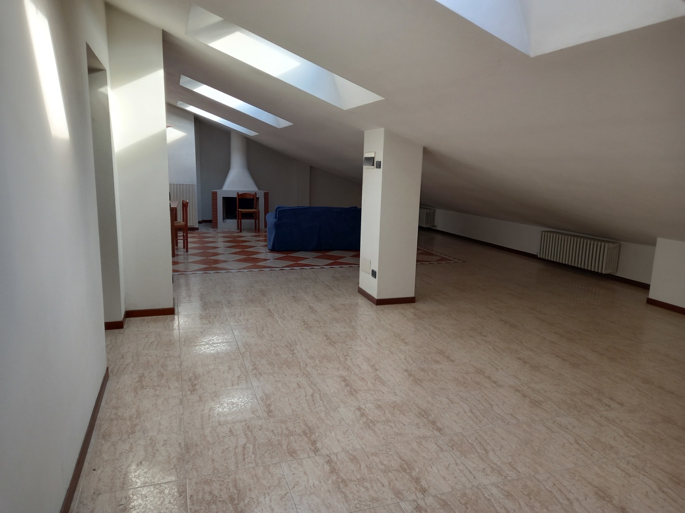 Attico arredato in affitto a Verona