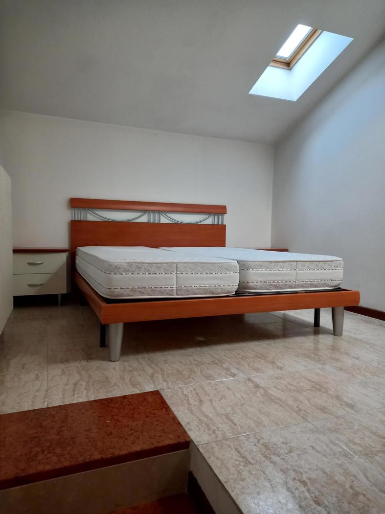 Attico arredato in affitto a Verona