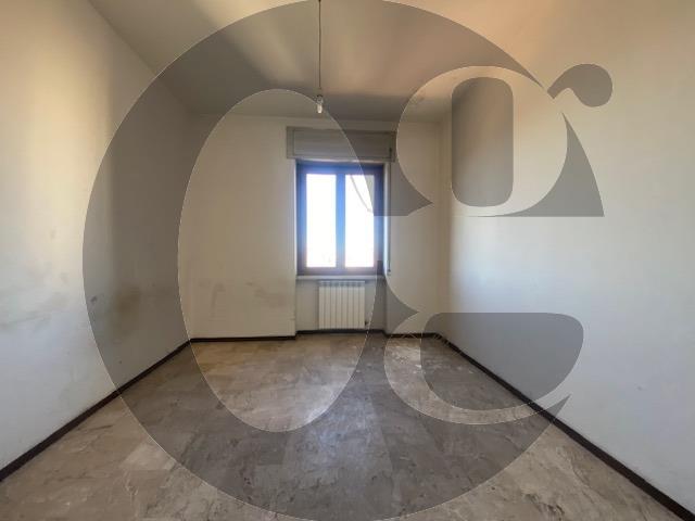 Quadrilocale con box a Brescia