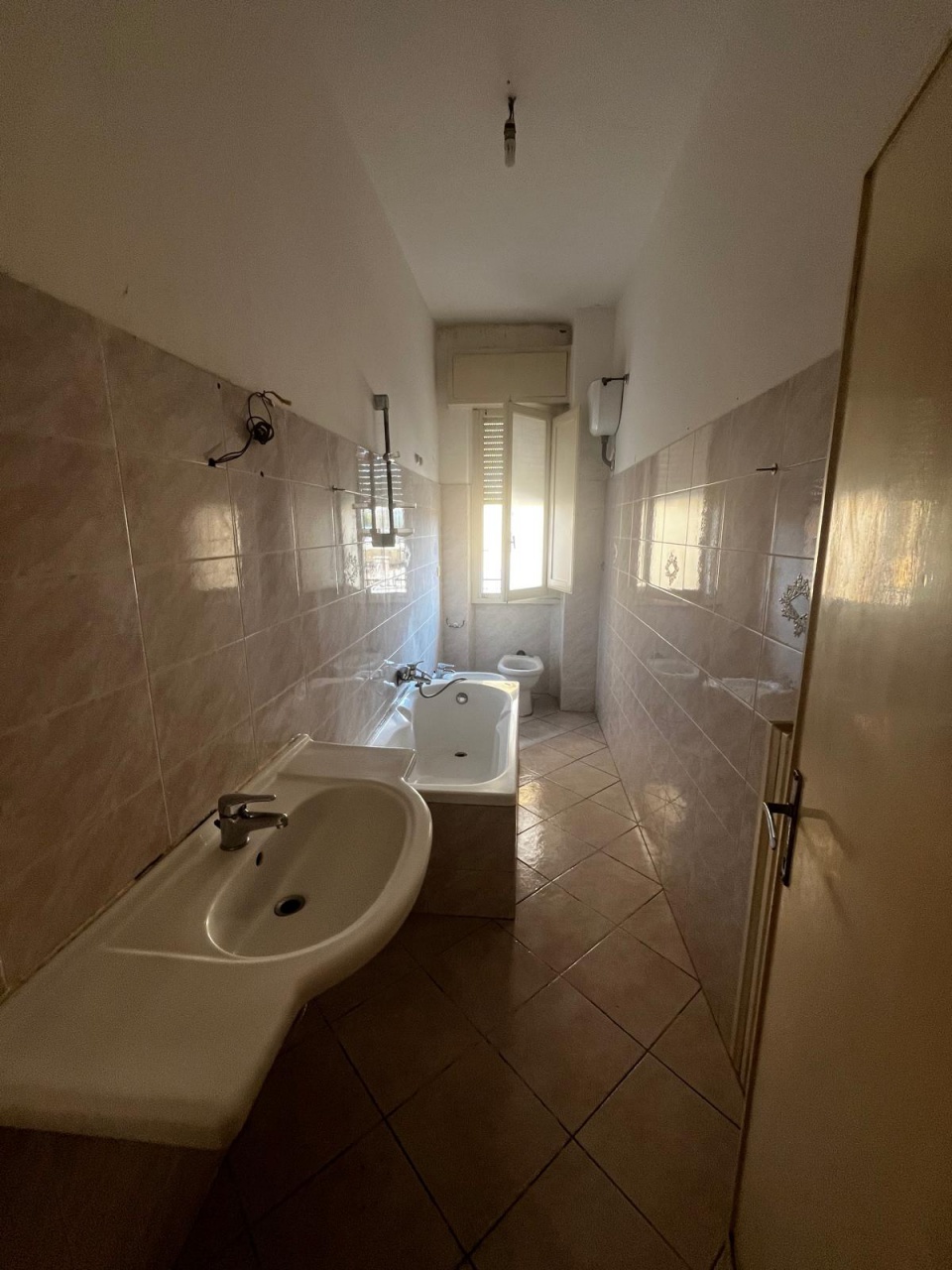 Appartamento con terrazzo in via della stazione, Signa