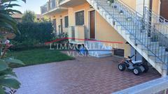 Appartamento con giardino, Massa marina di